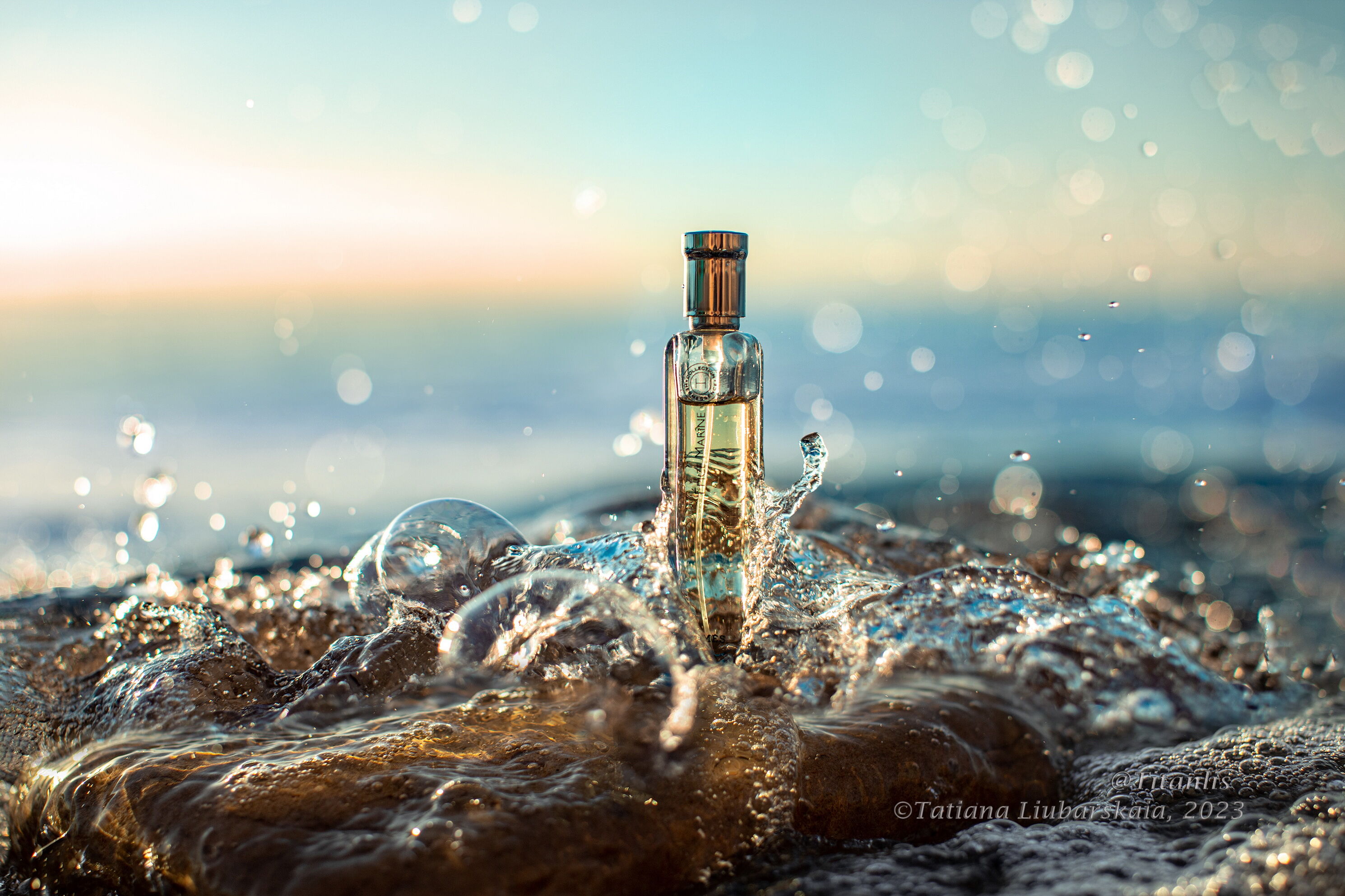 photo of Hermes spray bottle and marine landscape by Tatyana Lubaskaya fragrantica
