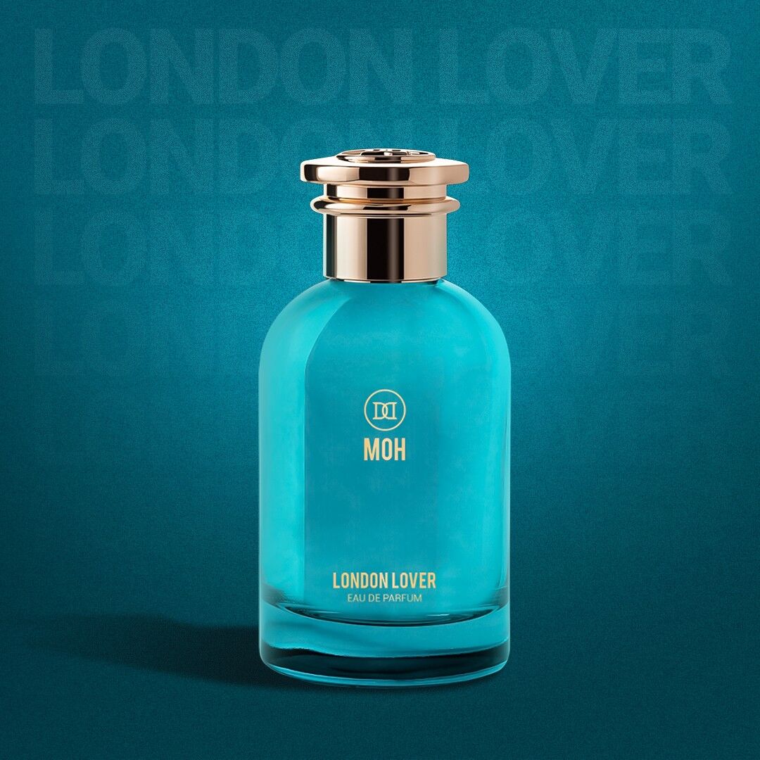 A bottle of London Lover on a turquoise backdrop with the name showing faintly behind