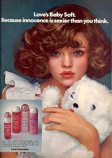 Love's baby soft ad with girl kid holding her teddy bear