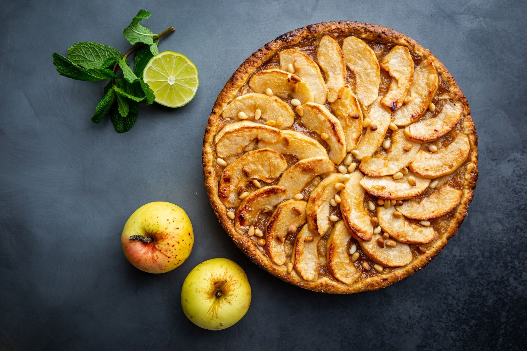 Apple pie laid on a worktop