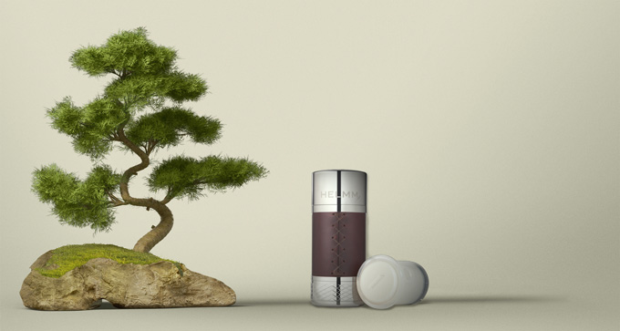 Helmm deodorant next to a bonsai tree