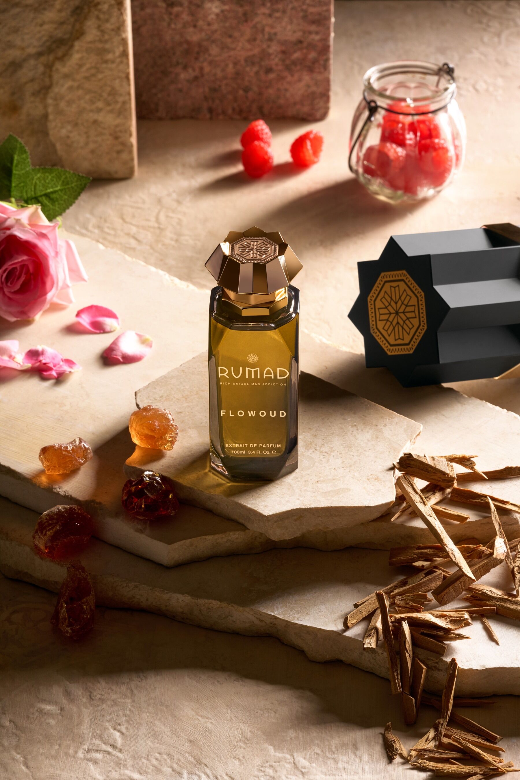 Flowoud by Rumad stood on pale stone blocks and surrounded by spices, woods, and flowers