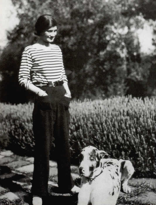 A casual Madame Chanel in with her Great Dane Gigot