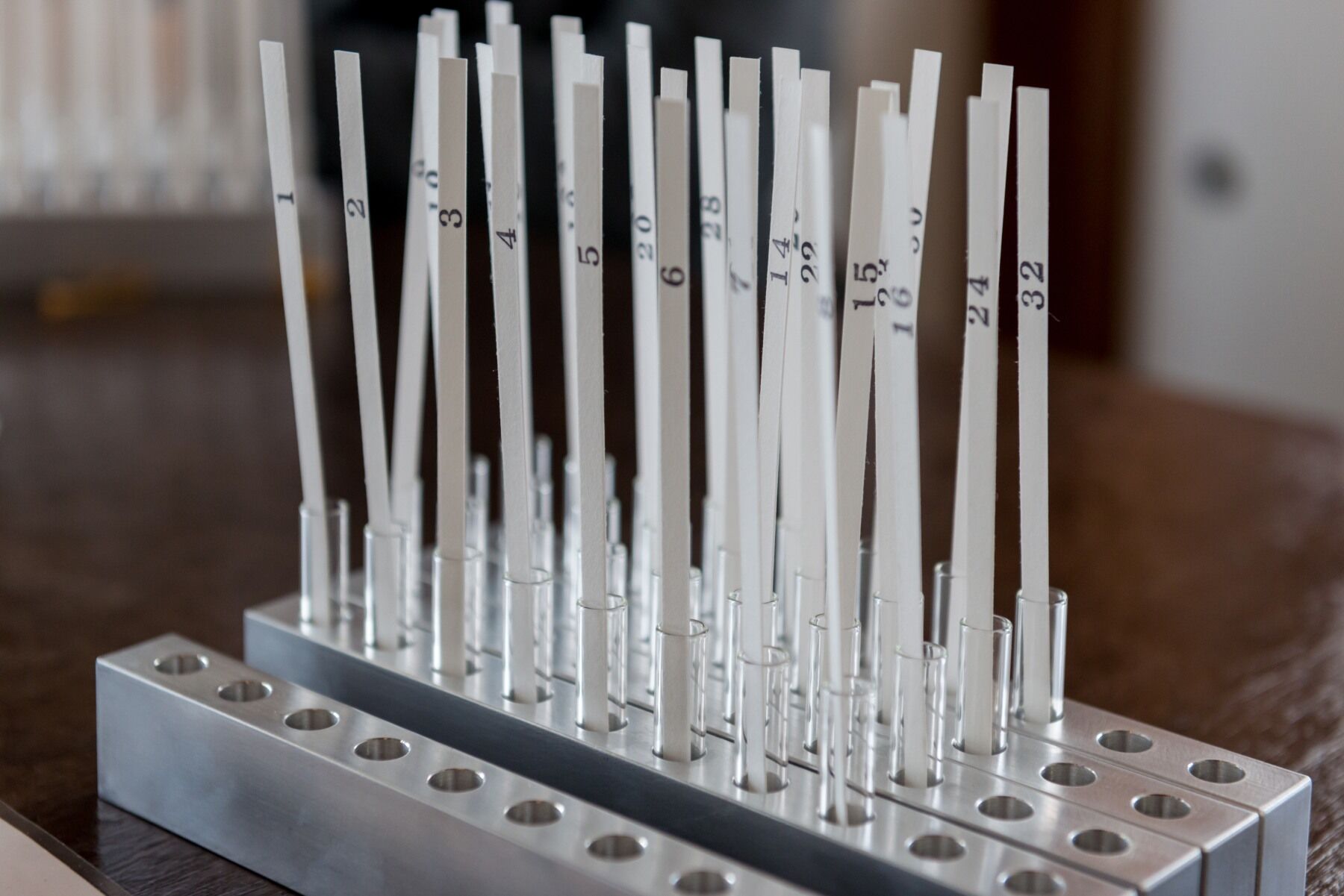 perfume blotters in a holder
