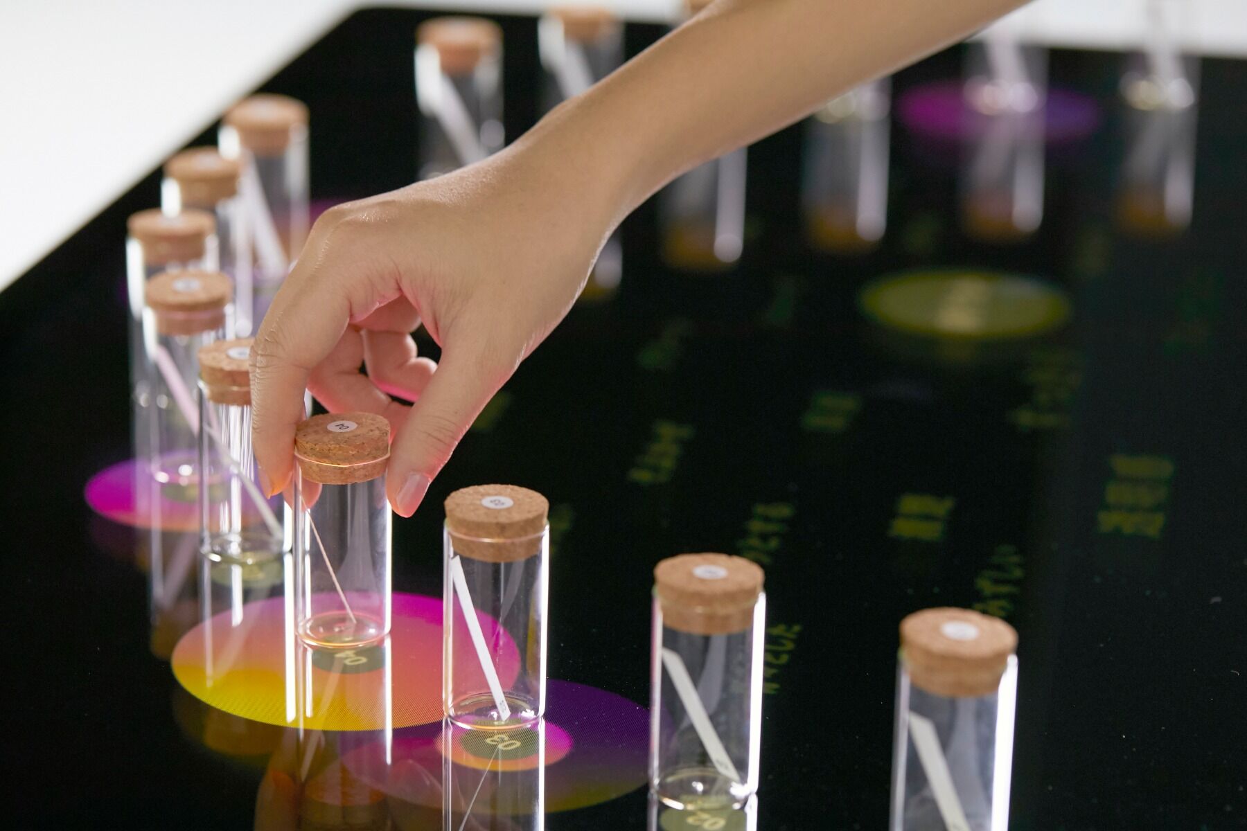 The Kaorium console with fragrance vials stood on it