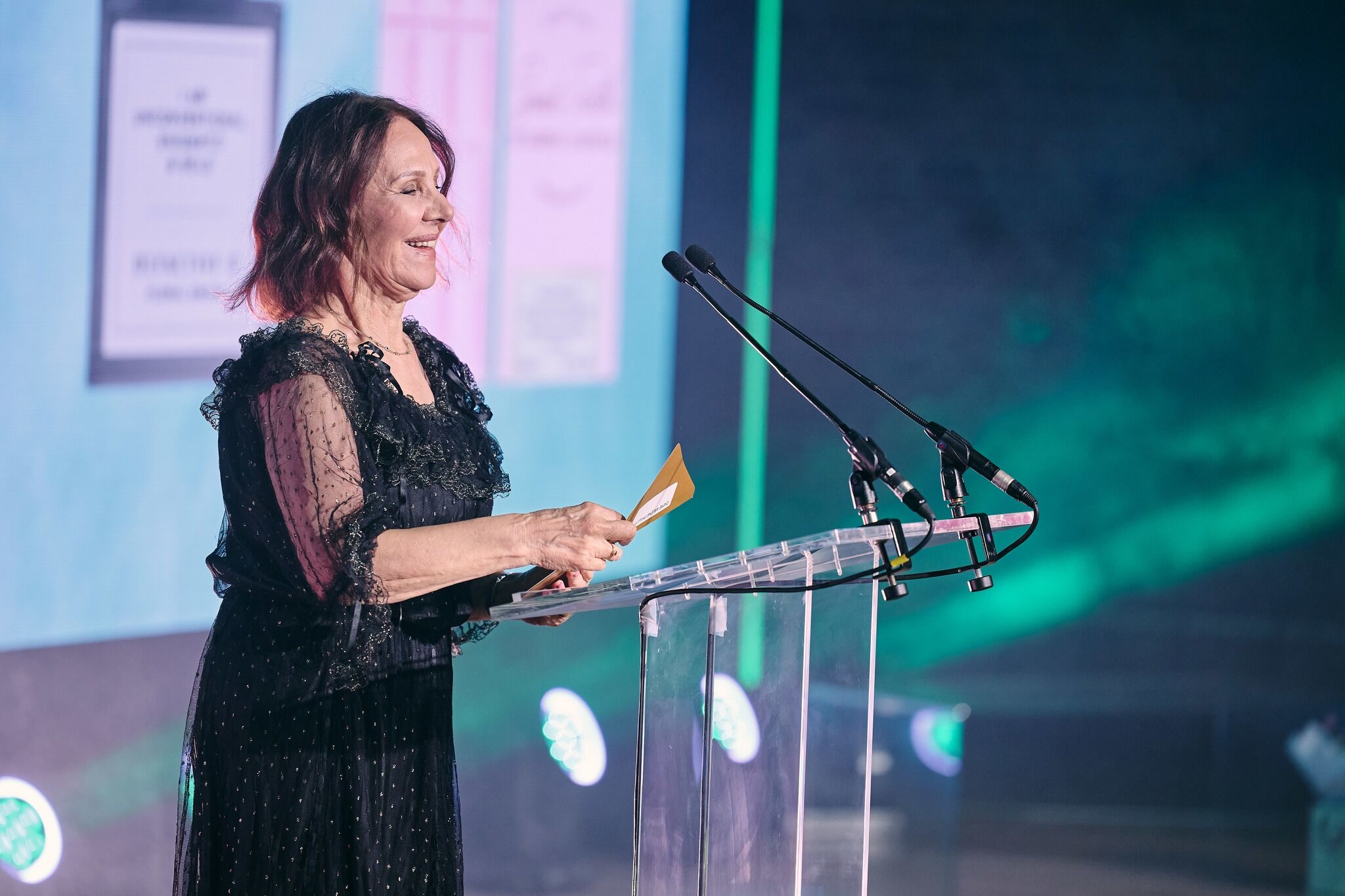 Dame Arlene Phillips presenting an award