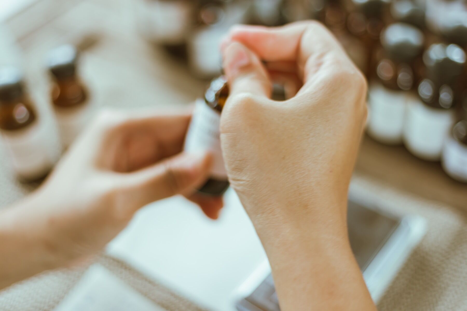 Hands doing perfume work