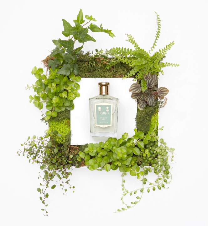 A bottle of Mulberry Fig by Floris surrounded by greenery