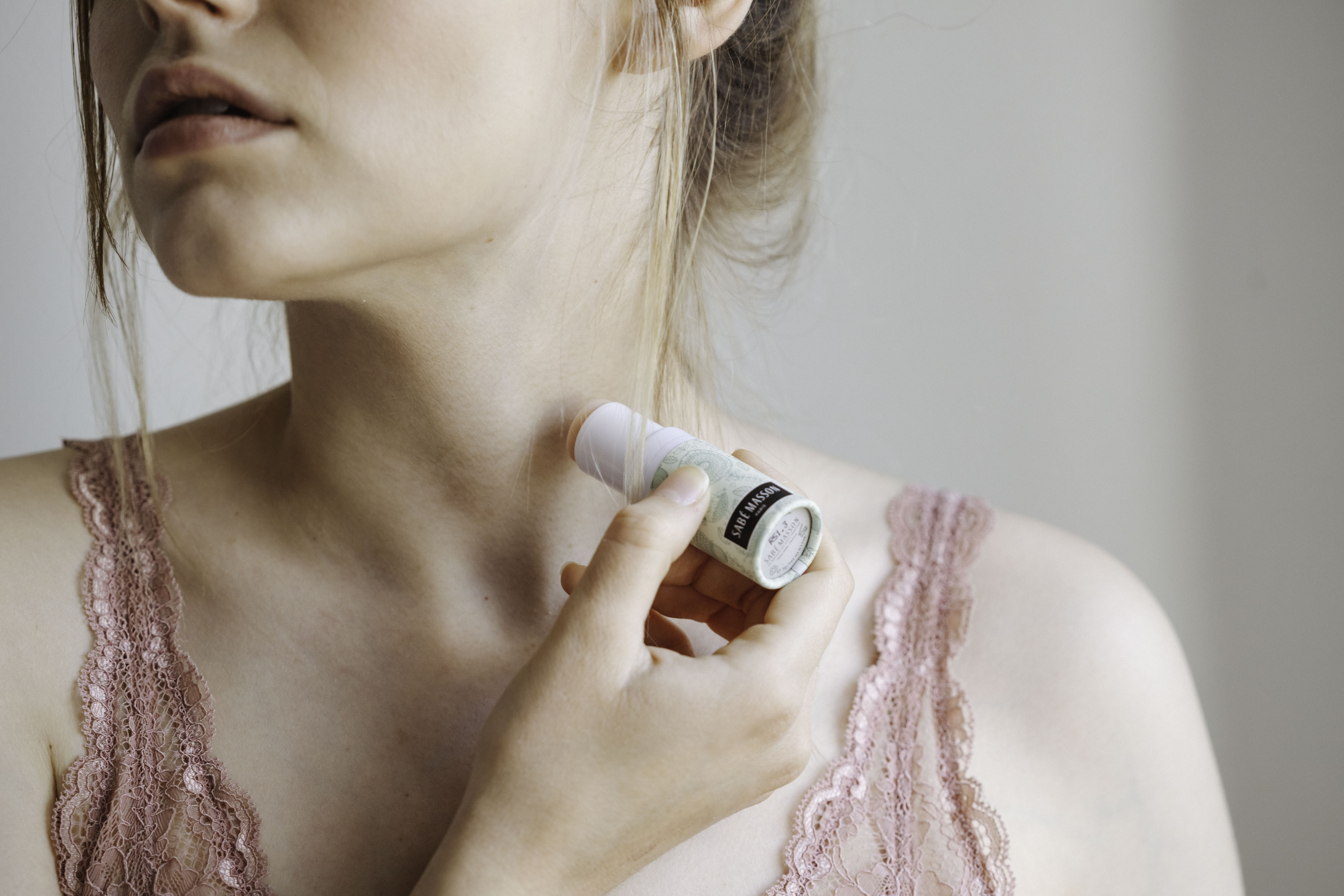 applying sabe masson perfume stick soft perfume