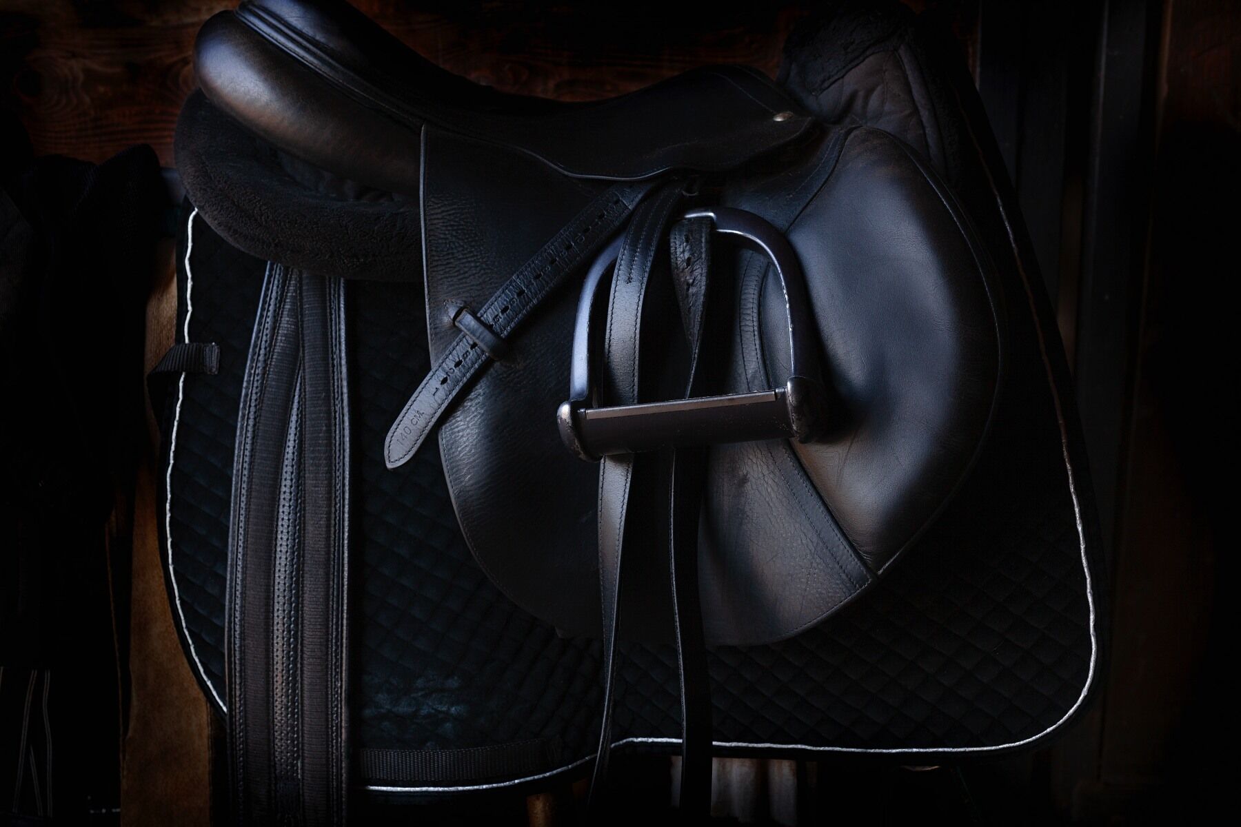 A dark leather saddle