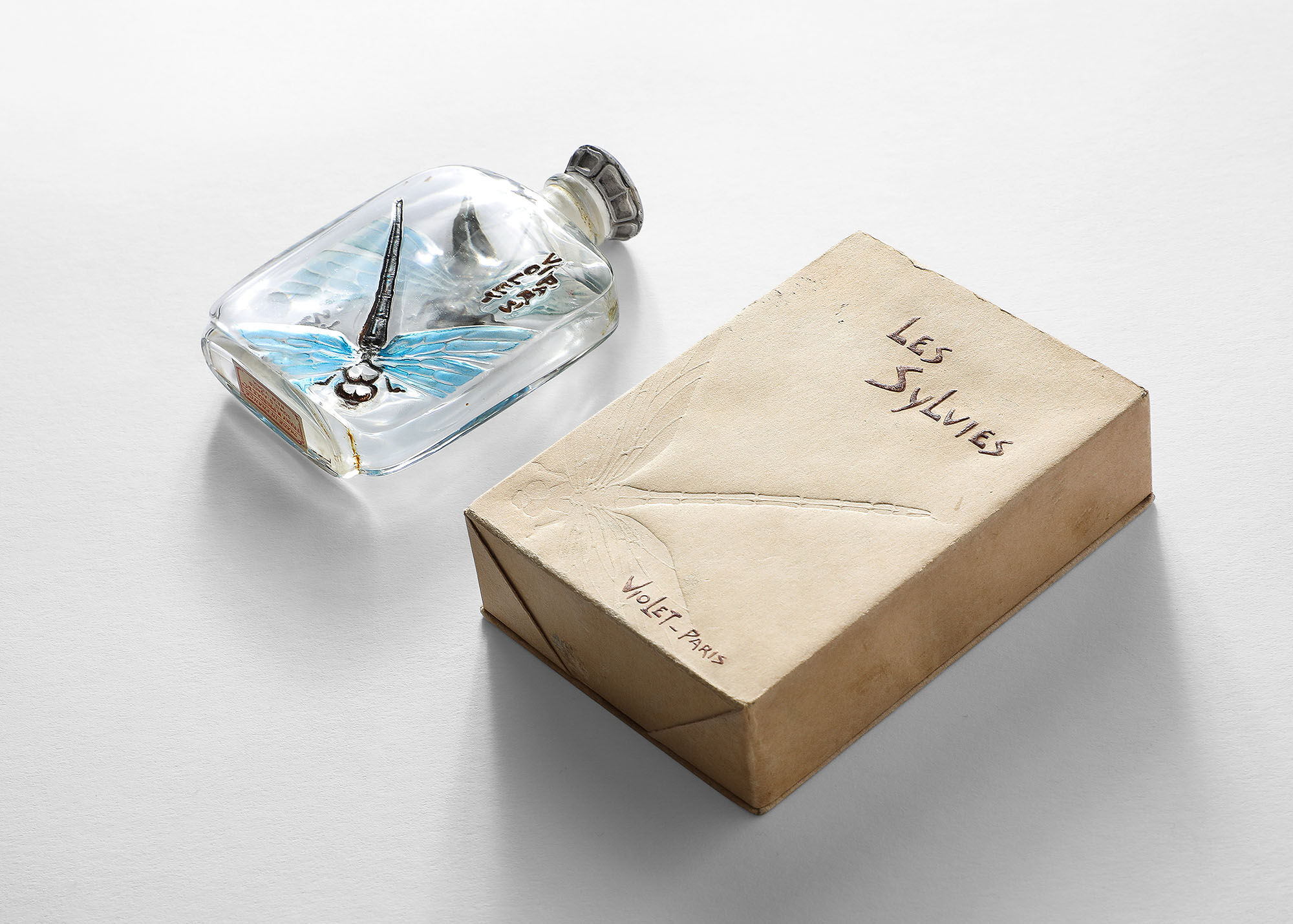 Obelisk shaped perfume bottle.