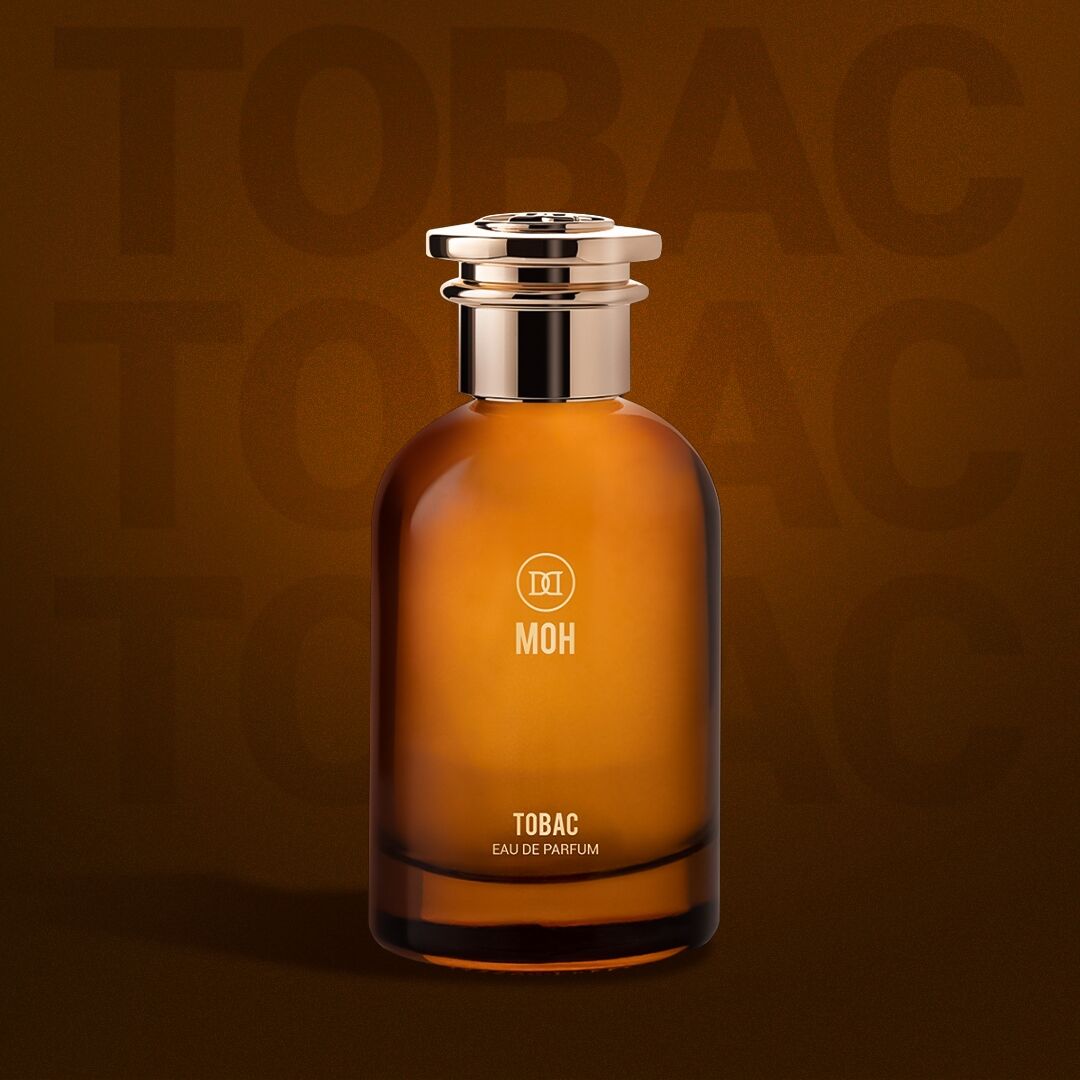 A bottle of Tobac on a brown backdrop with the name showing faintly behind