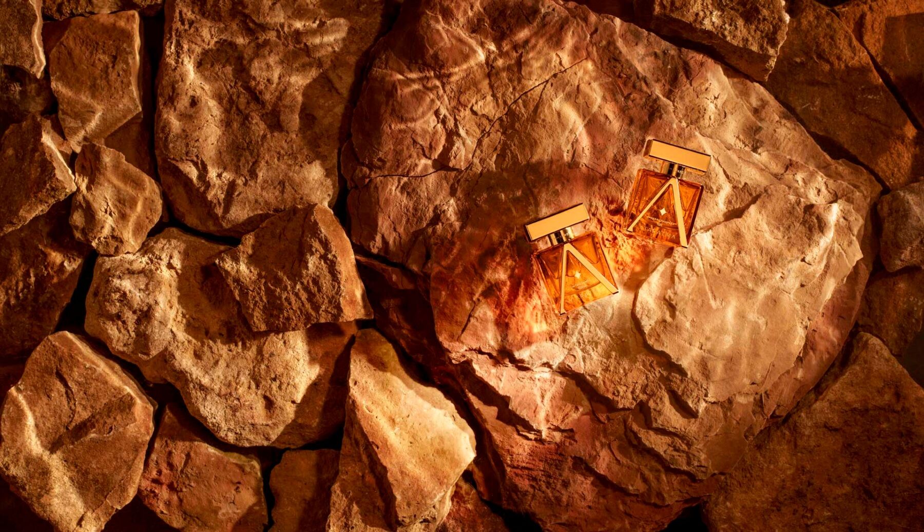 Two Ataratma perfumes on stones