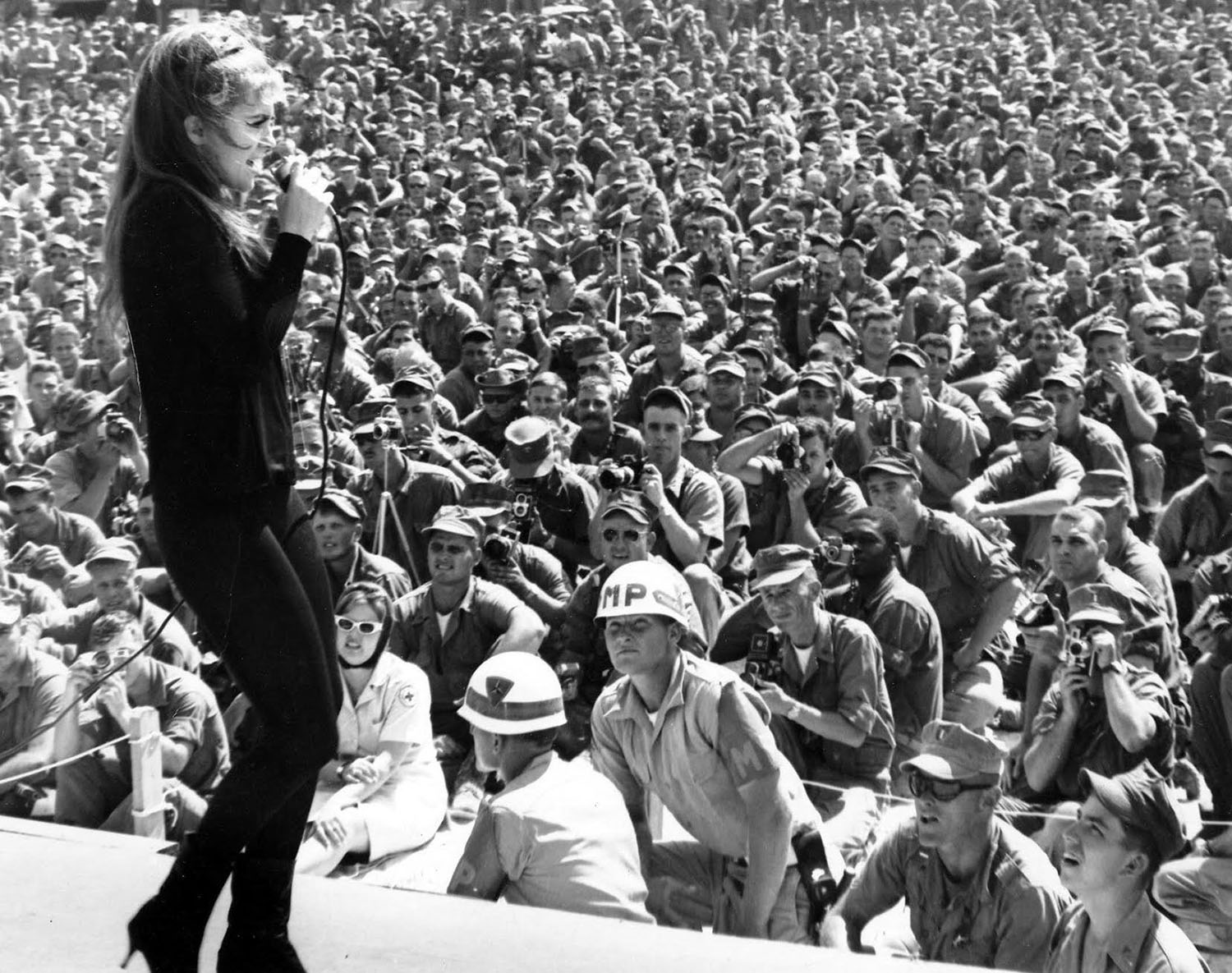 Ann-Margret performs in front of US troops in southeast Asia, 1960s.