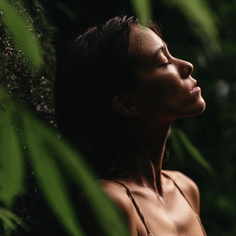 Coco de Mer visual woman in jungle