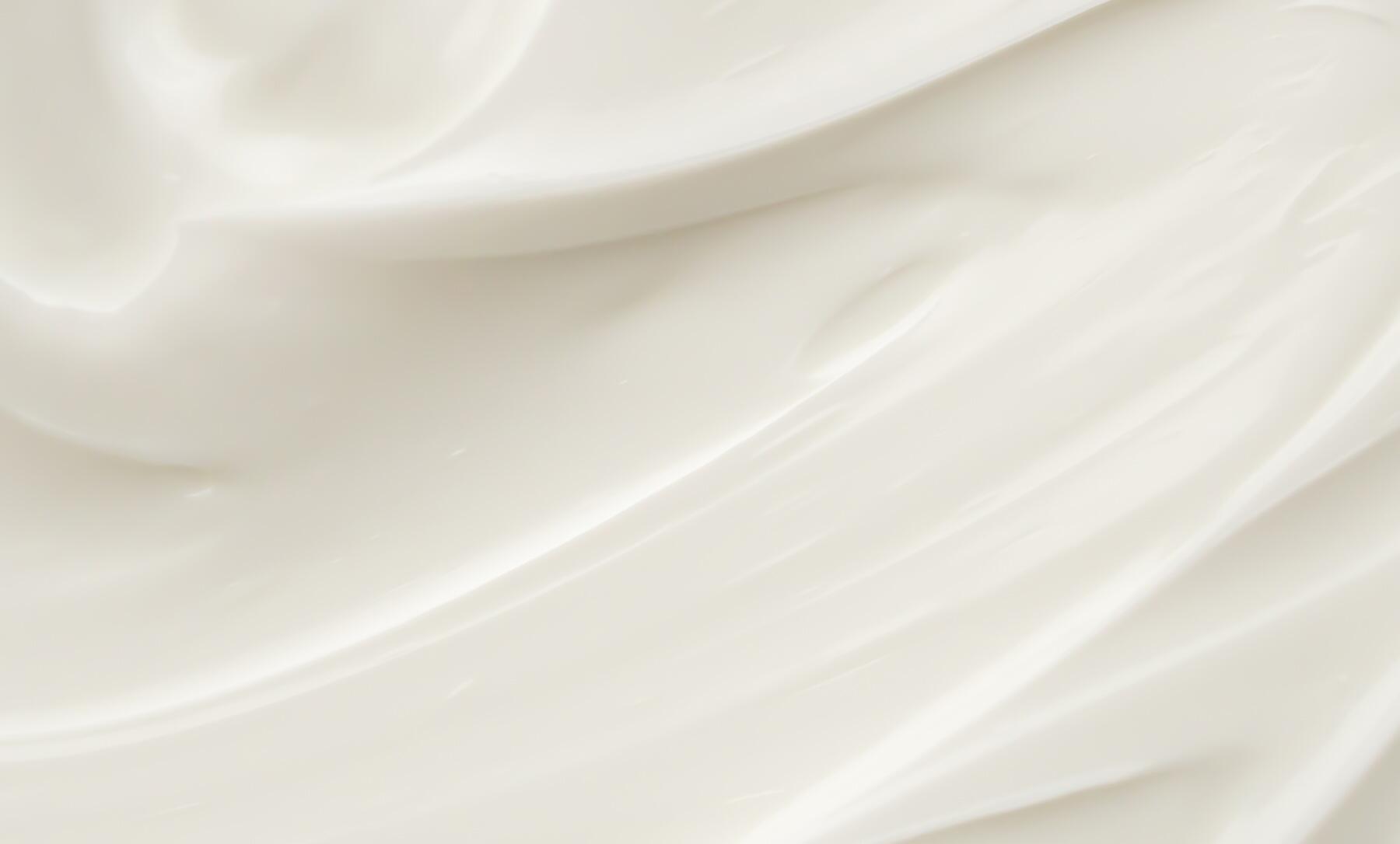 A close up of cream showing a smooth texture in white