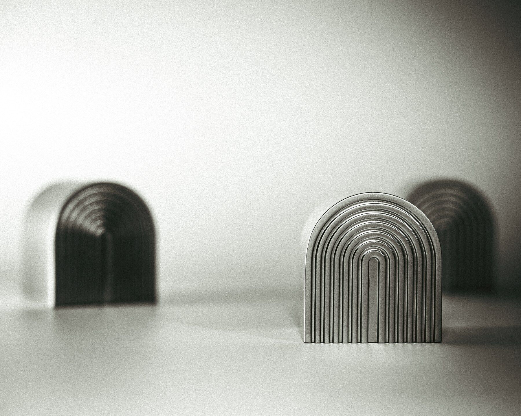 The caps of Seven Gates perfumes which look like small rainbows