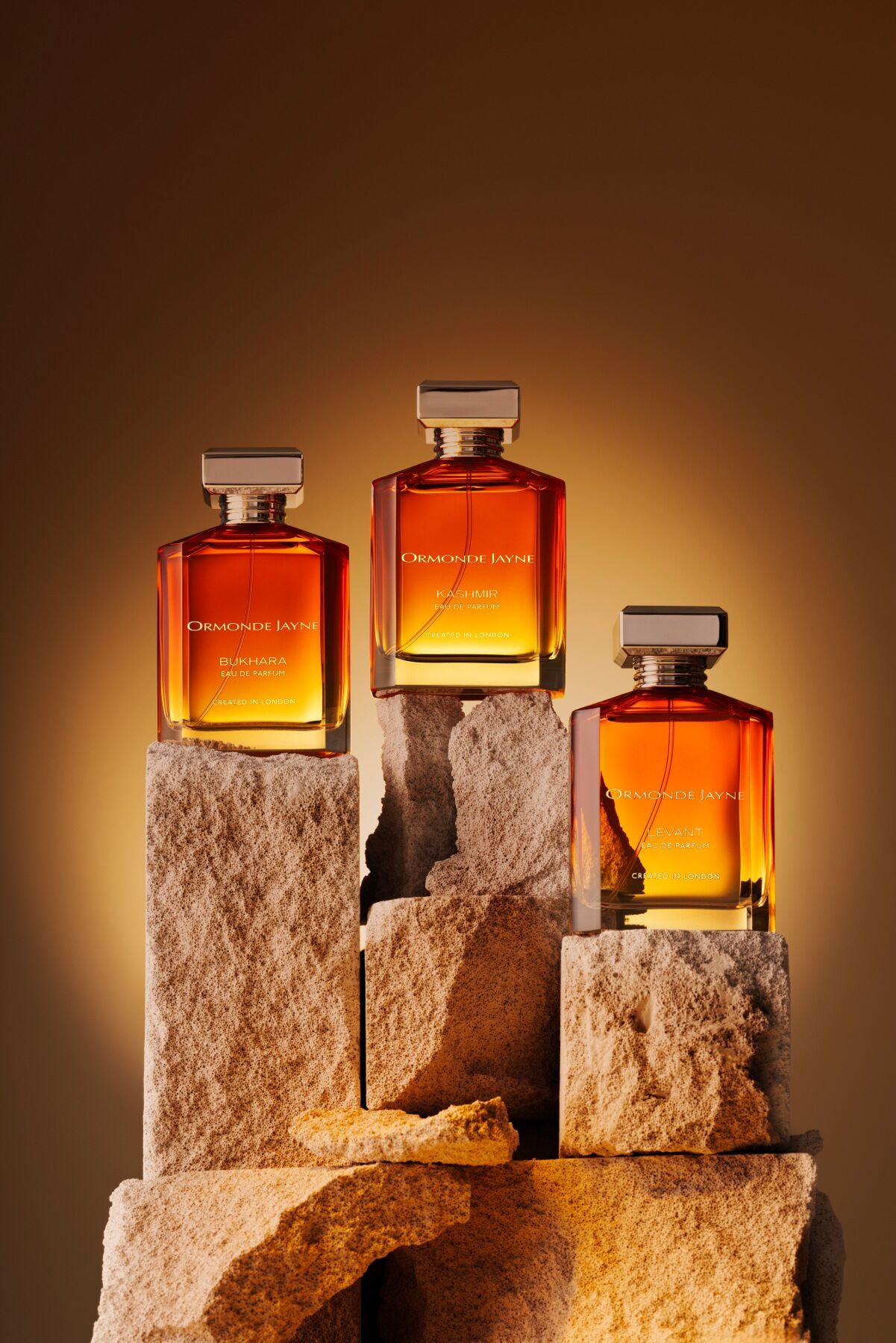 Three perfumes on stone pillars