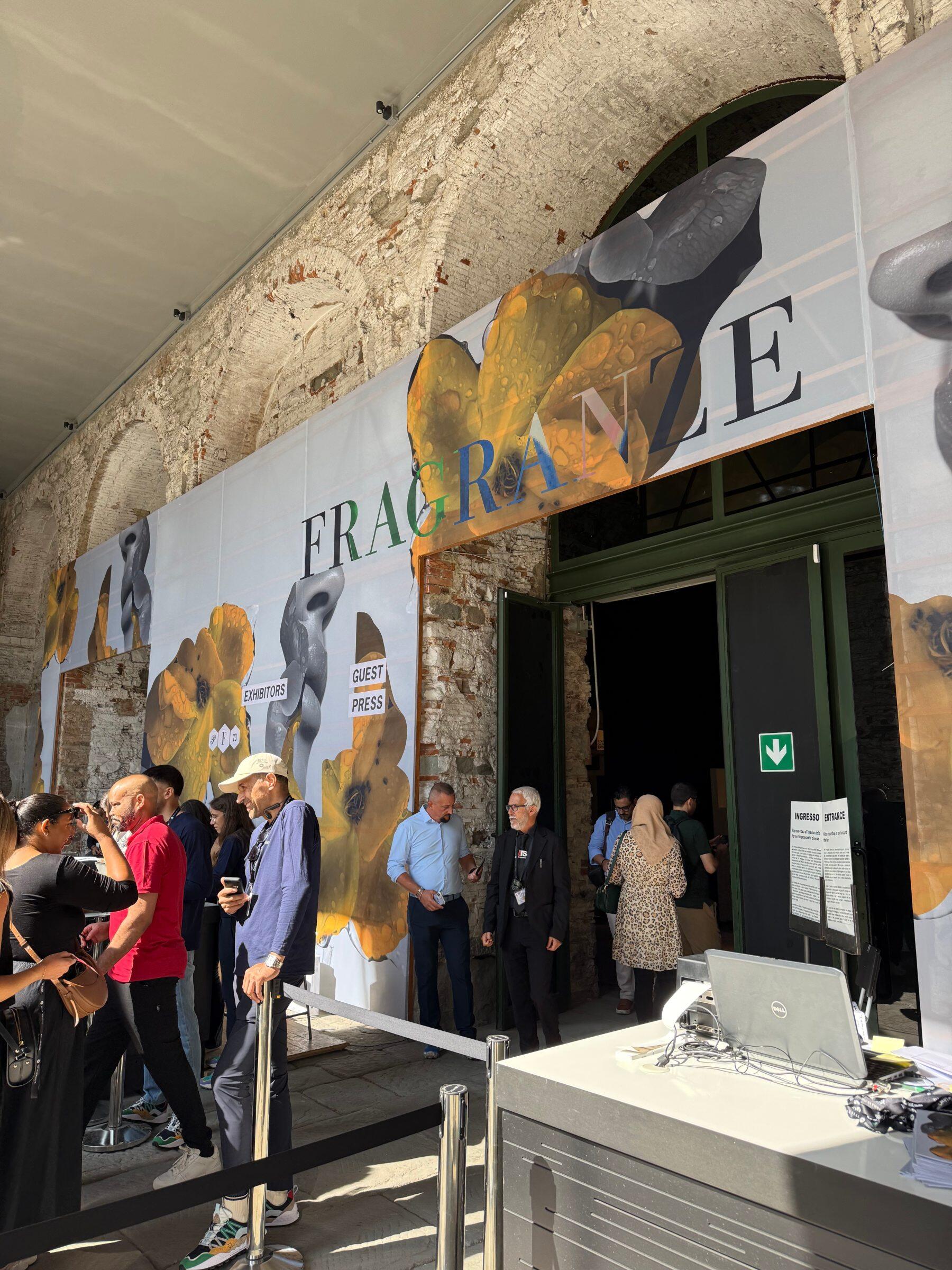 People outside the perfume fair in a queue