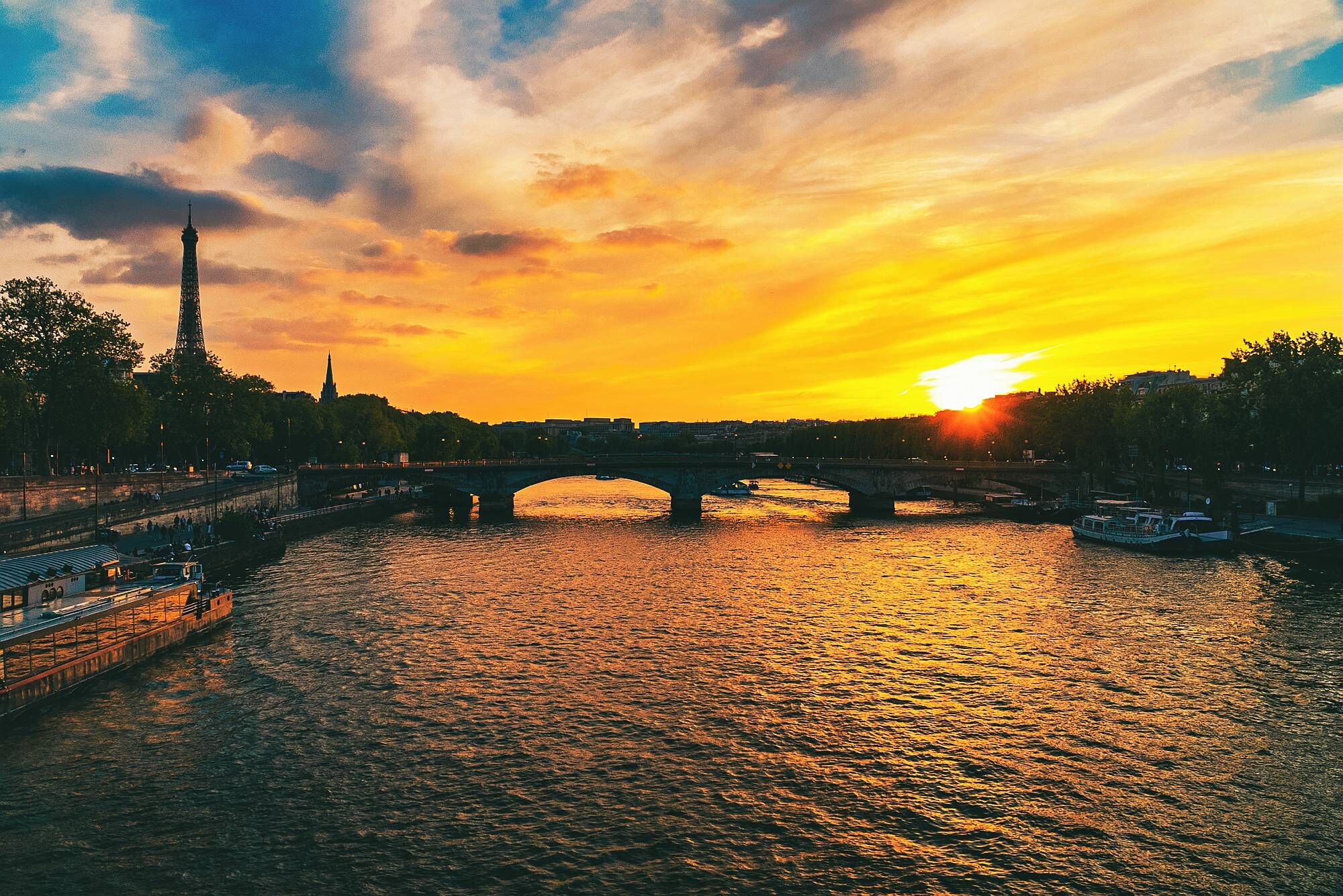 Beautiful landscape with colorful sunset overlooking the Seine river. Paris, France. 