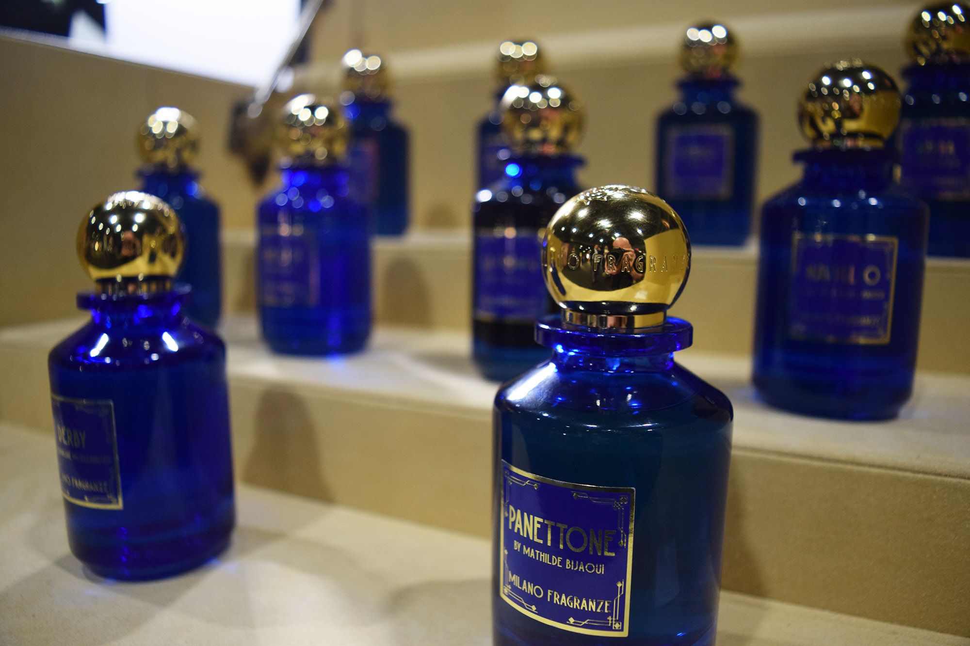 Milano Fragranze Pannetone and other fragrances in the line in a trunk cabinet.