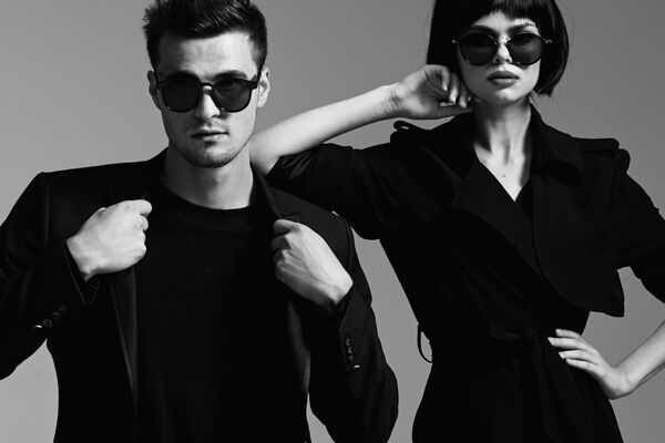 Man and women in a blaclk outfit