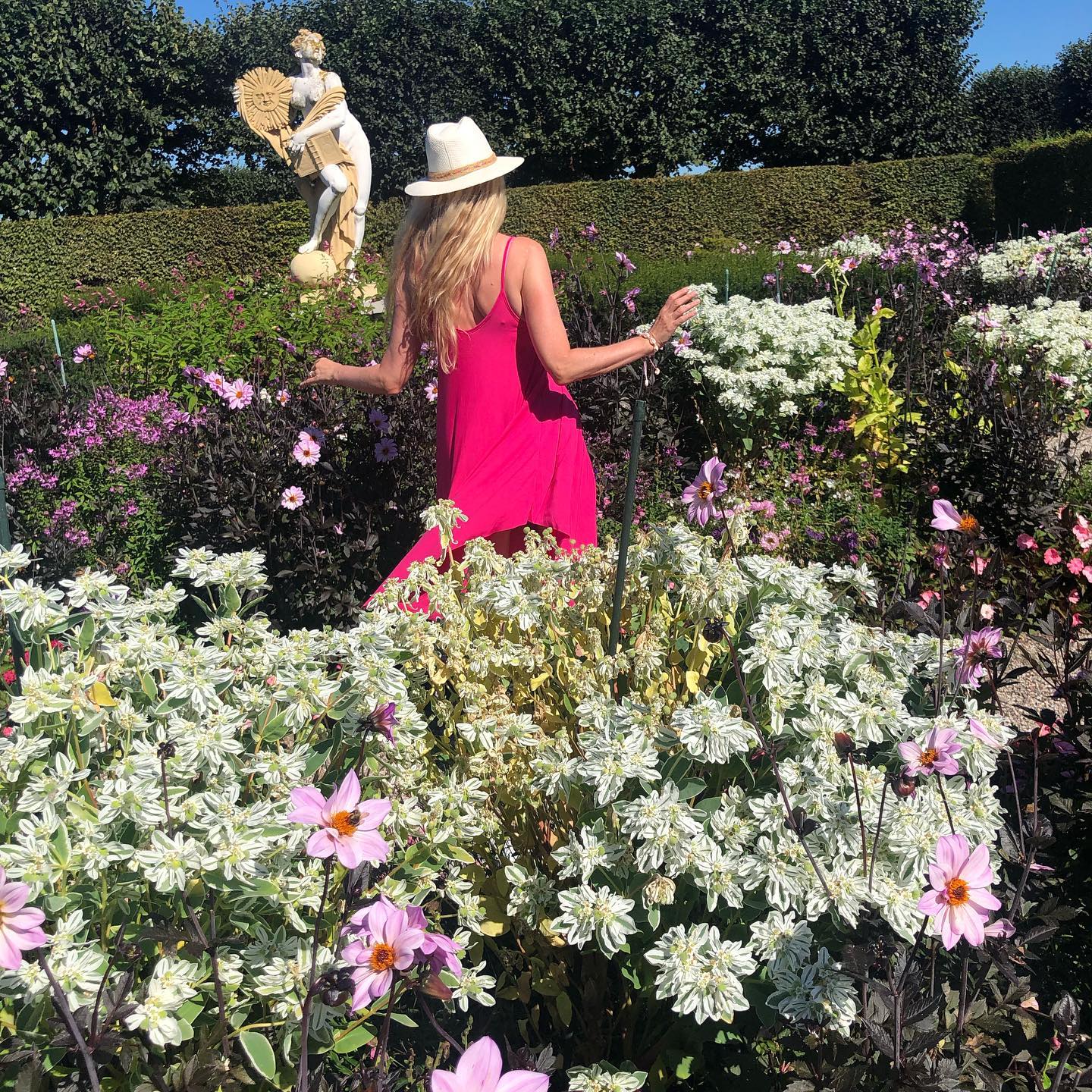 Perfumer Tanja Bochnig surrounded by flowers