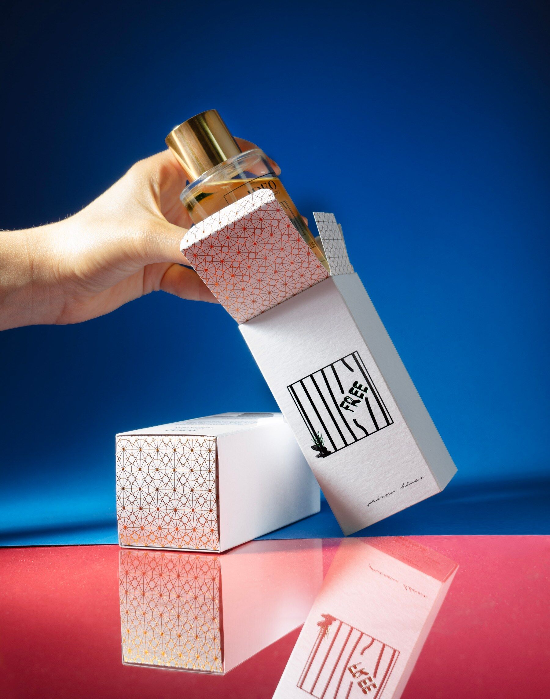 Prison Blues with a hand reaching for it