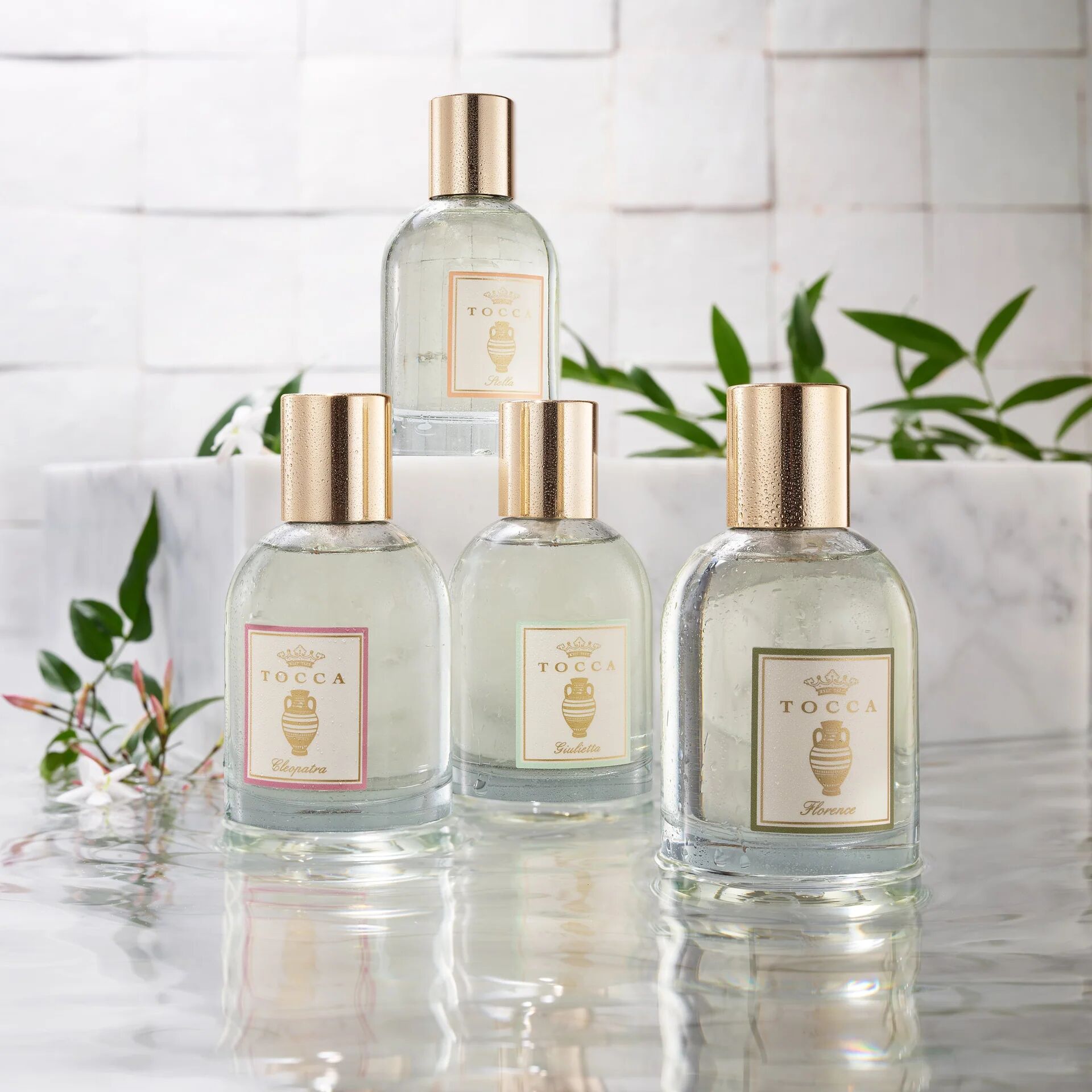 tocca bottles of body oil 