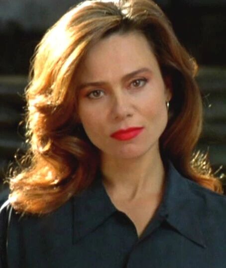 Lena Olin as Mona Demrkov in Romeo is Bleeding