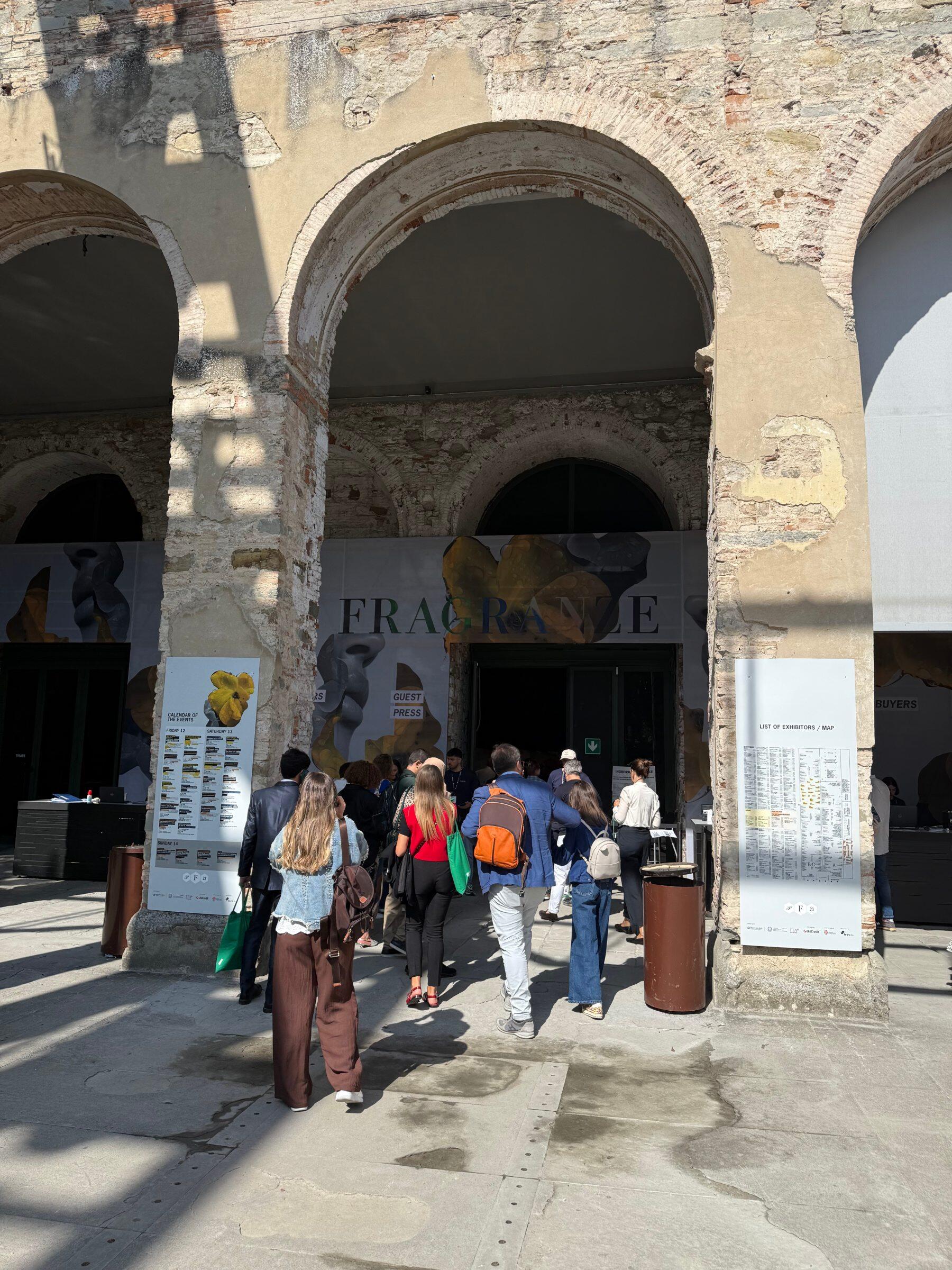 A queue of people entering the perfume fair