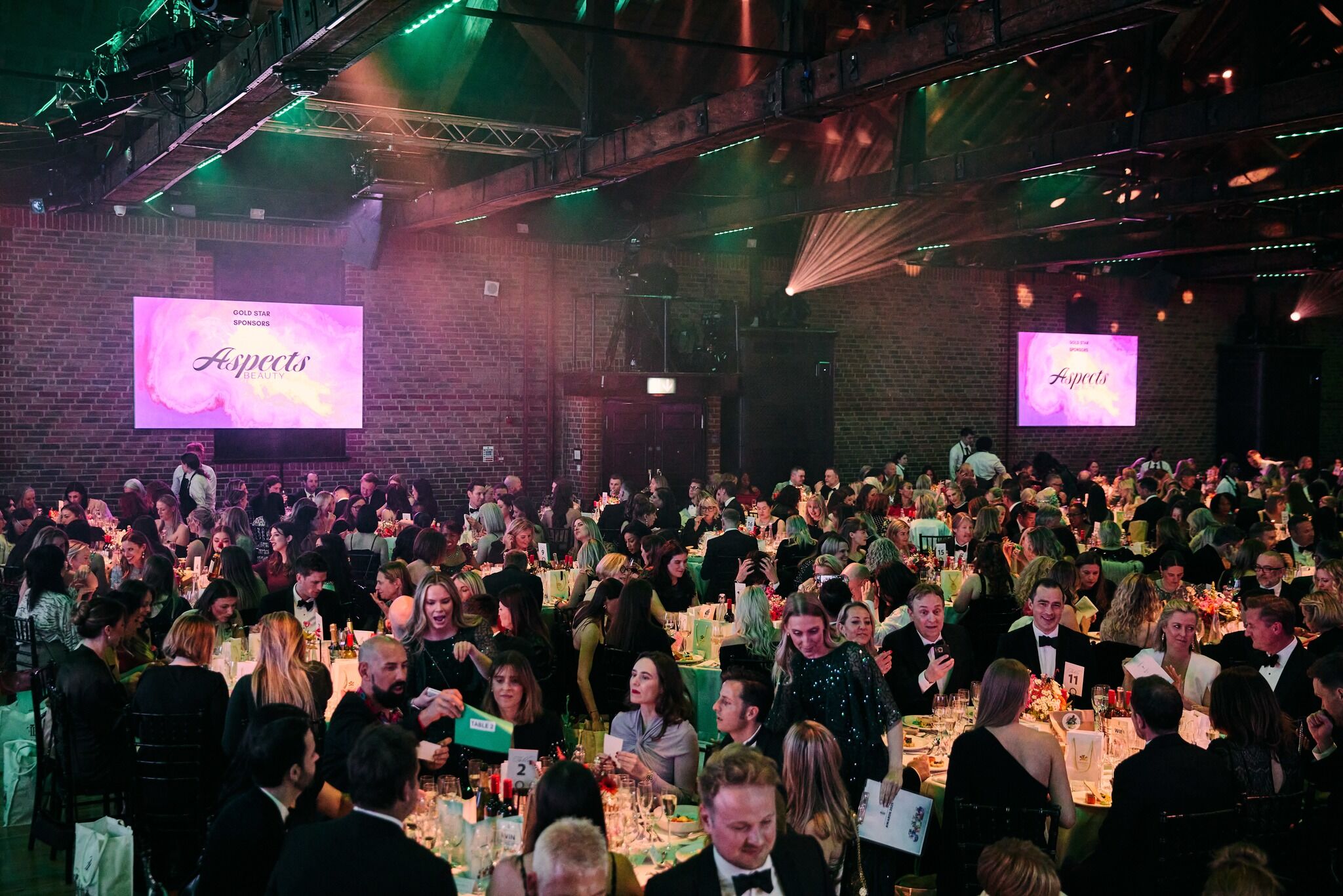 The hall where the event was held with everyone seated for dinner
