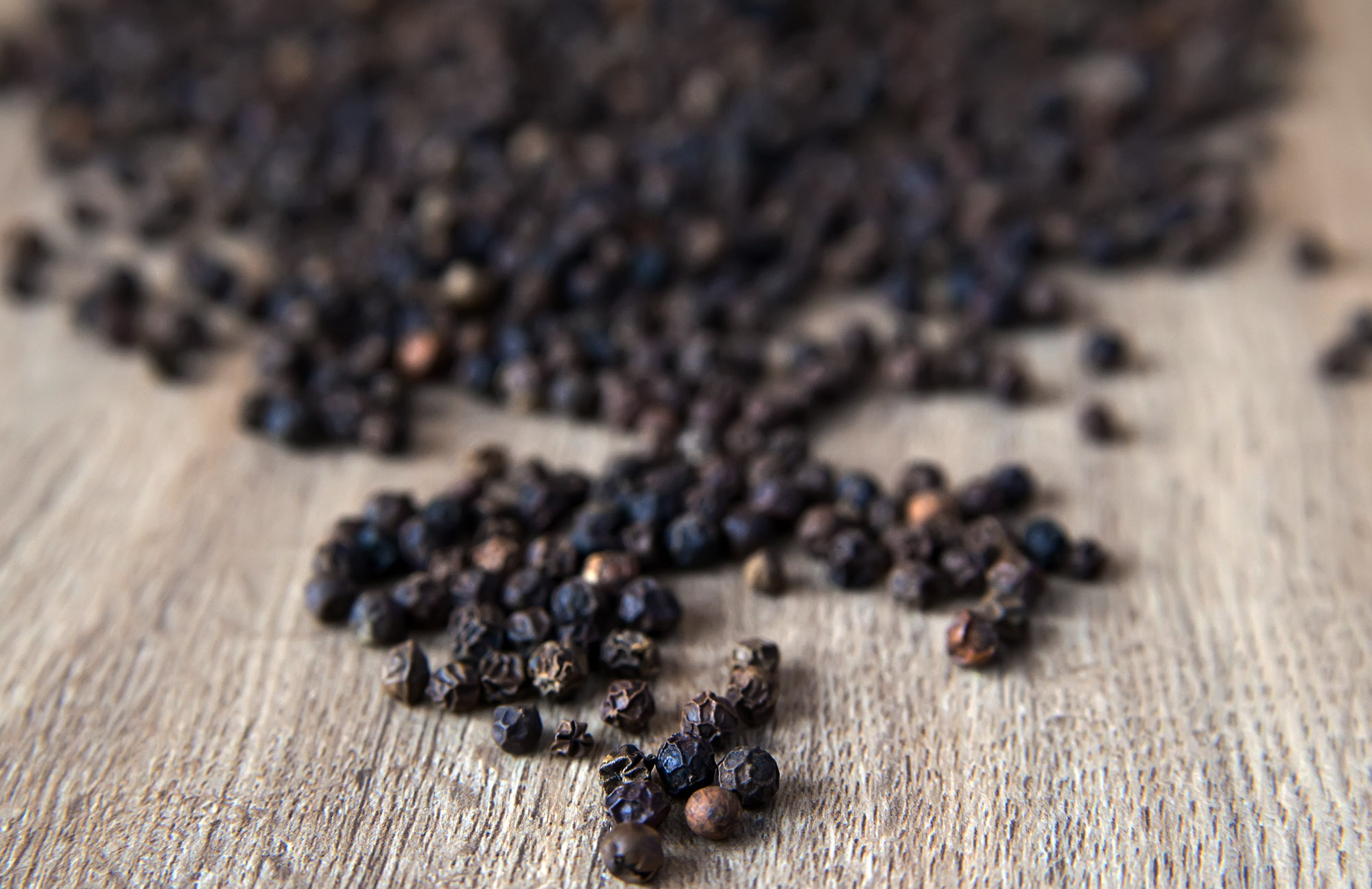 black peppercorns.