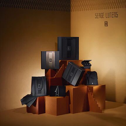 serge lutens bags for gifts stacked on a pile