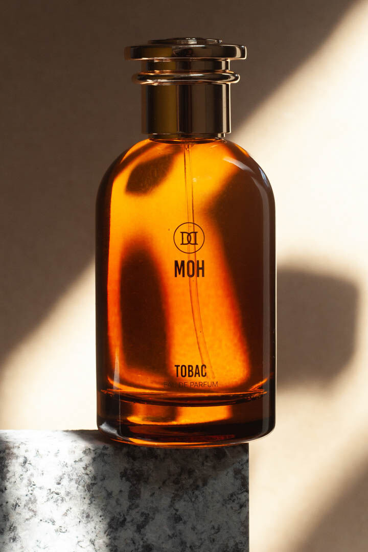 A bottle of tobac on a stand