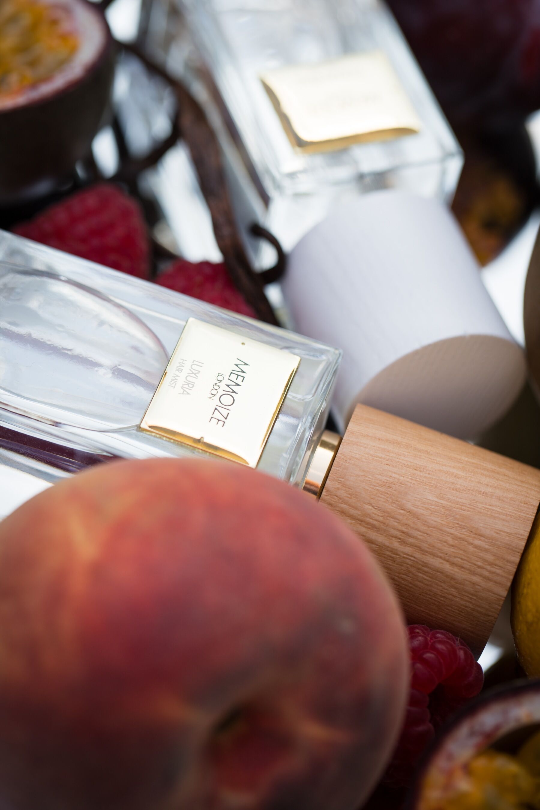 The Memoize hair mists nestled in and amongst peaches
