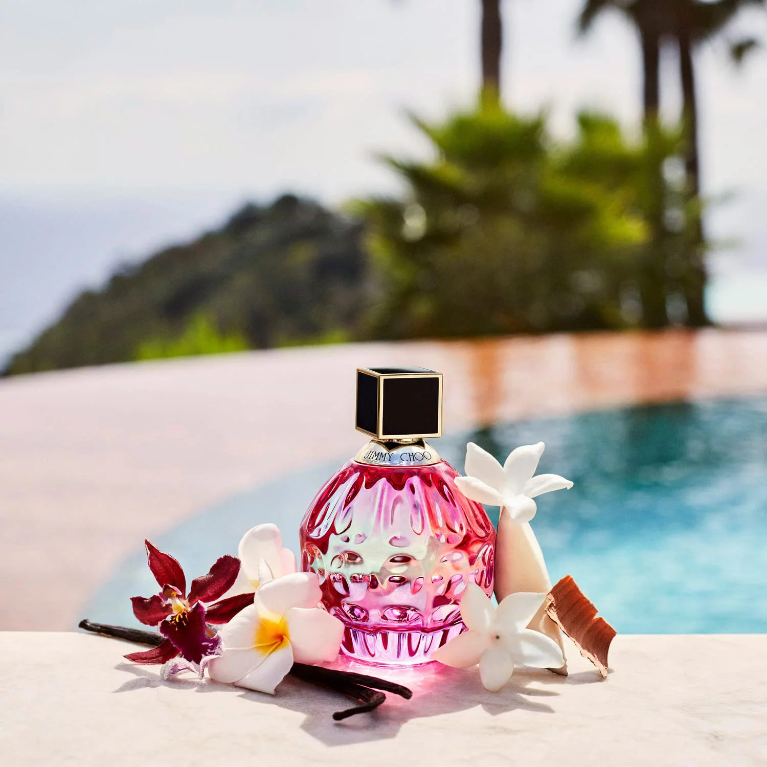 Jimmy Choo Rose Passion ad photo bottle by pool