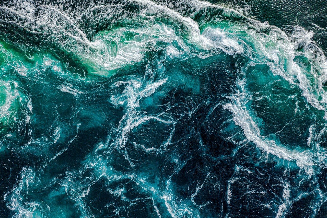 water waves and foam in the ocean