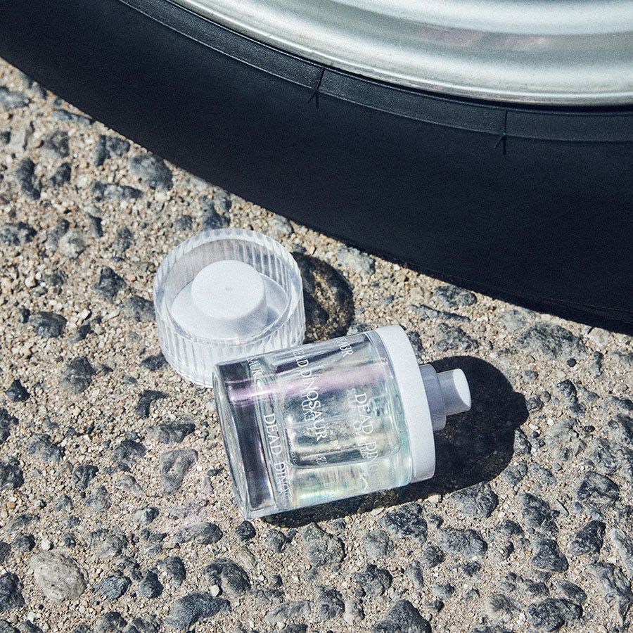 Dead Dinosaur bottle in ad poto