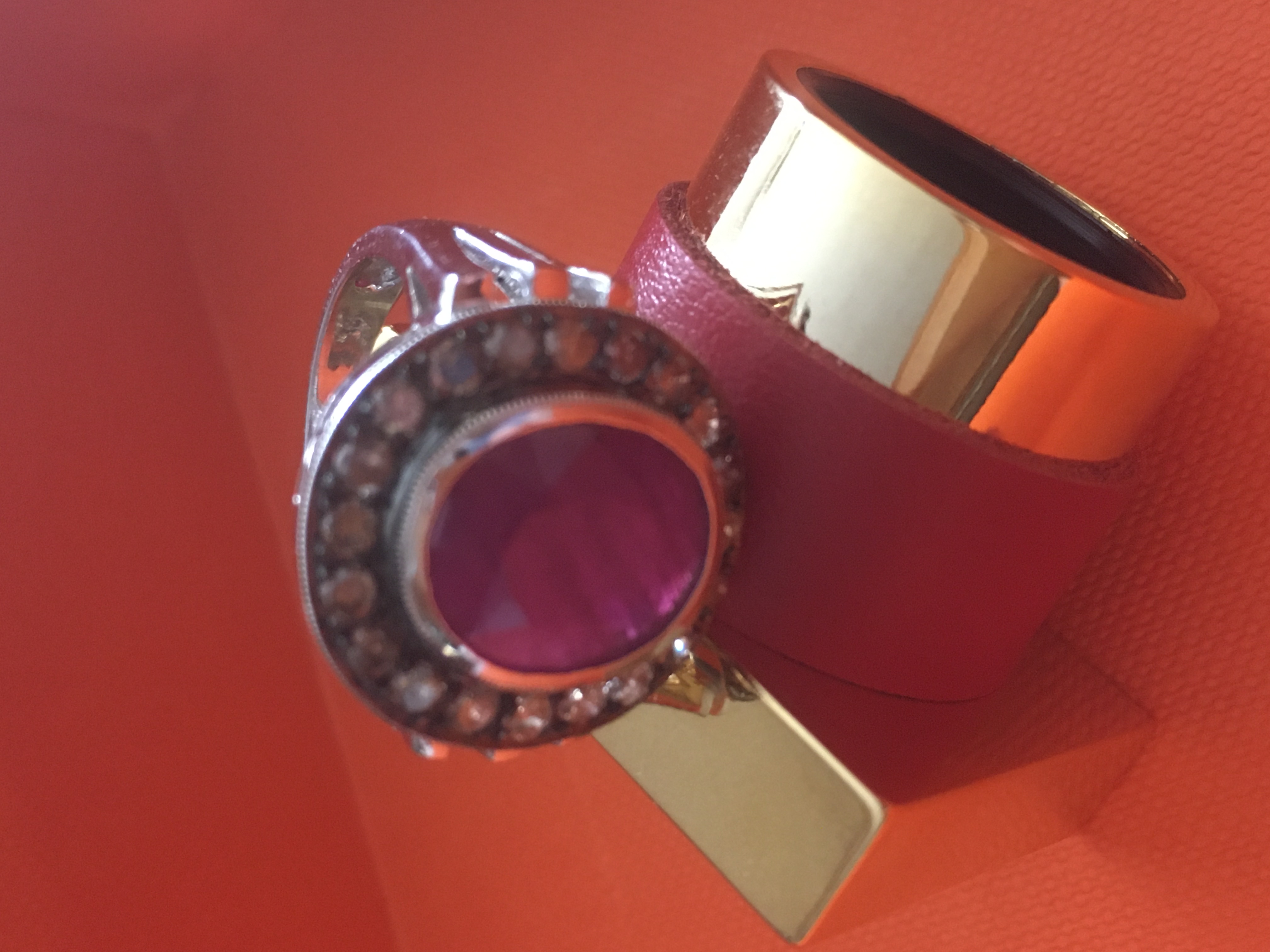 ruby and diamonds ring poised on perfume cap, author's own photo Elena Vosnaki