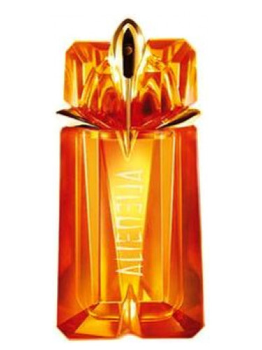 alien perfume orange bottle