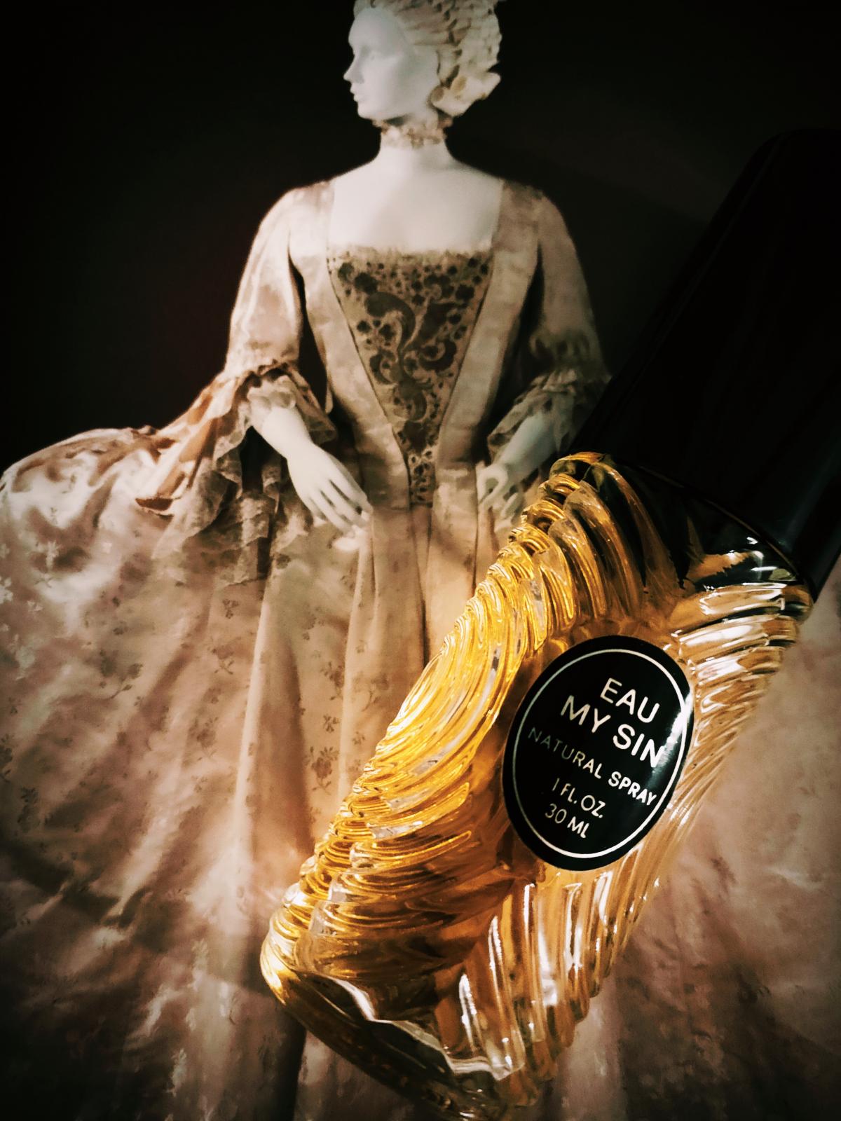 eay my sin bottle photographed with aristocrat woman from a book in the background