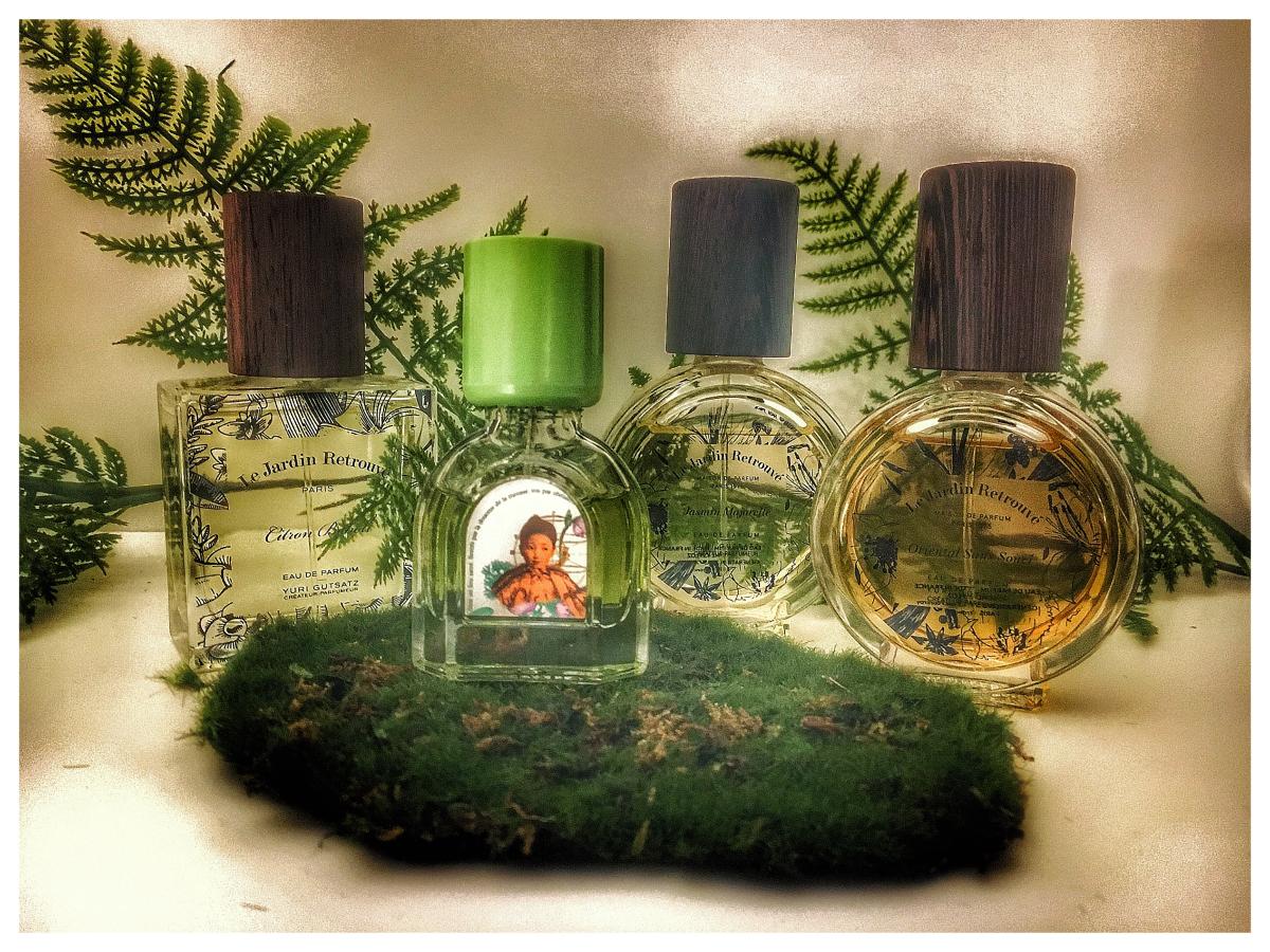 Le Jardin retrouve bottles collection with ferns in the background photo by Tiwalii on fragrantica