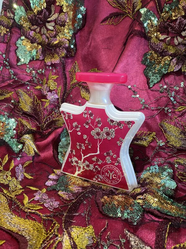 Chinatown bottle with brocade background.